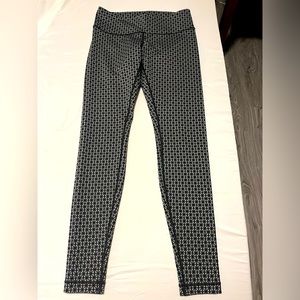 Size 6 US LuluLemon leggings, black and silver, low rise, heavier weight fabric
